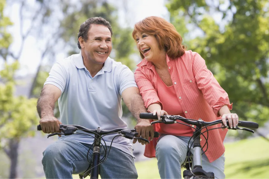 Woman and man riding bikes