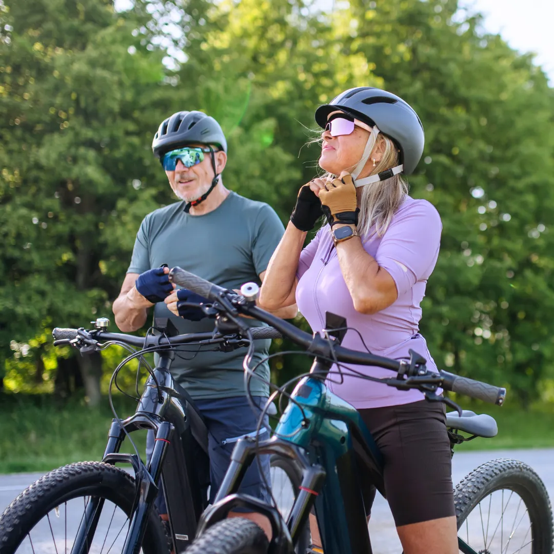 Couple stopping to take a break while biking